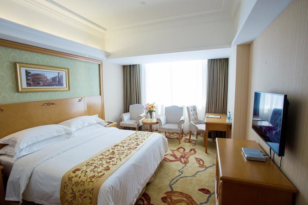 Vienna International Hotel Lijiang Yuxue Avenue מראה חיצוני תמונה
